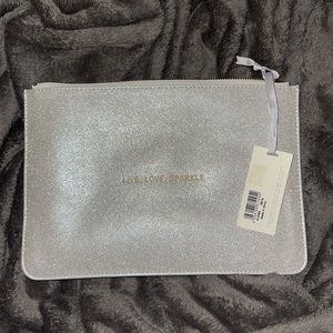 NWT LARGE SPARKLE POUCH. BEST QUALITY. LIVE SHOW